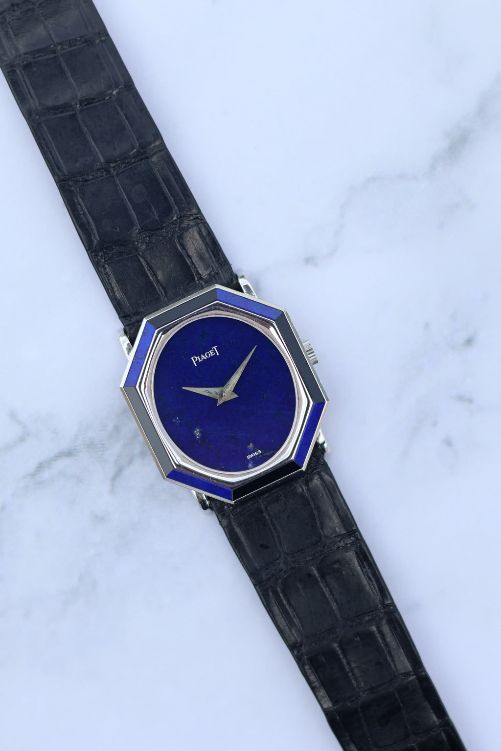 Piaget Ref. 9341 vintage watch with lapis lazuli dial and alternating lapis and onyx stone-set bezel in 18K white gold