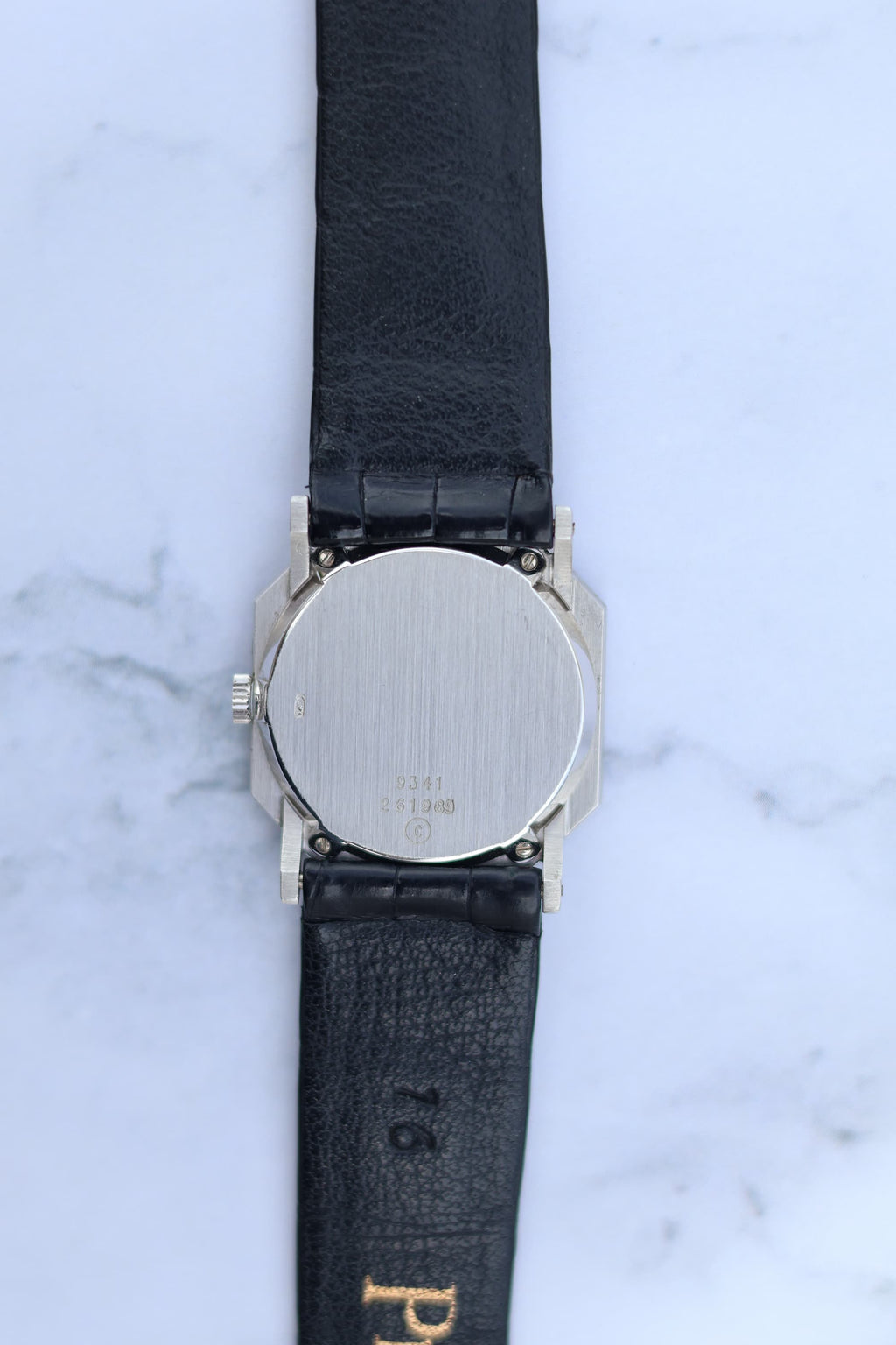 Case back of Piaget Ref. 9341 in unpolished 18K white gold with rectangular case shape and original finis