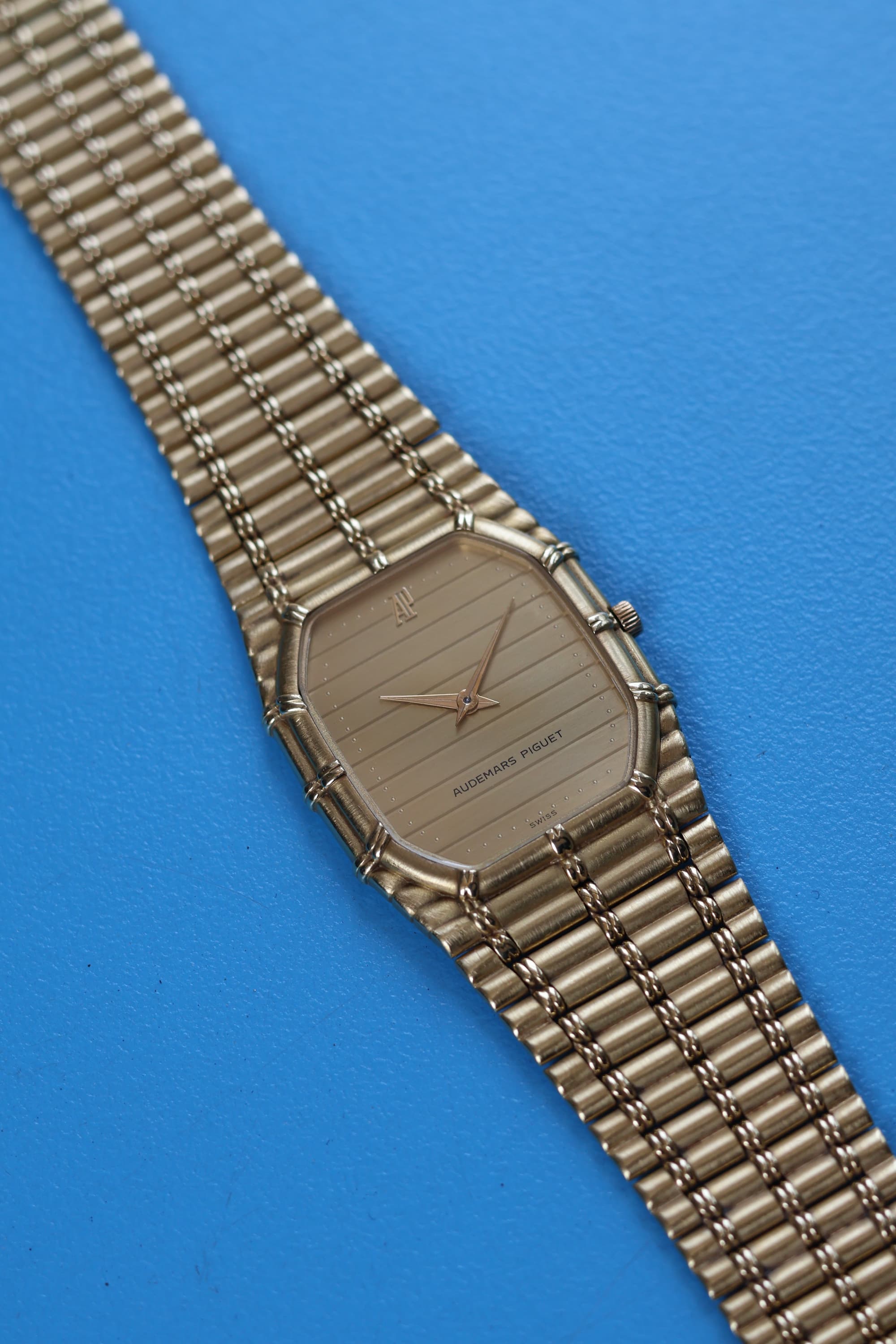 Detailed dial shot of Audemars Piguet 27mm Bamboo showcasing ribbed linear finish and sapphire crystal