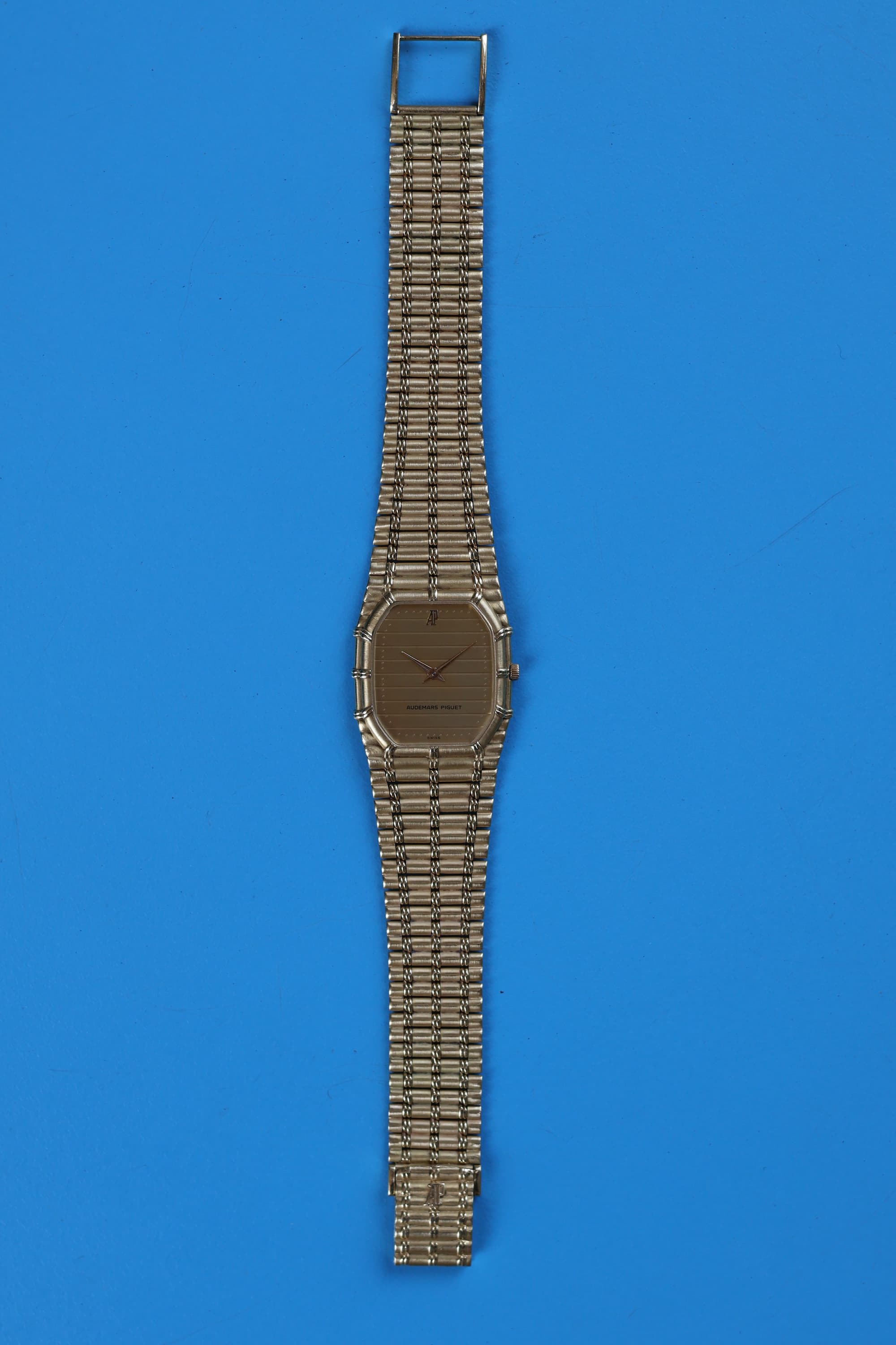 Audemars Piguet Bamboo 27mm watch in solid 18K yellow gold with ribbed dial and integrated bracelet, c. 1990