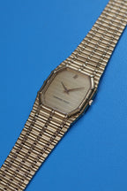 Side view of Audemars Piguet Bamboo watch showing fluted crown and gold case texture transition