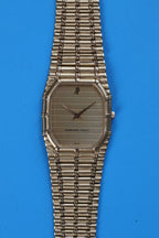 Semi-close view of AP Bamboo dial with gold-tone ribbed texture and minimalist hour markers