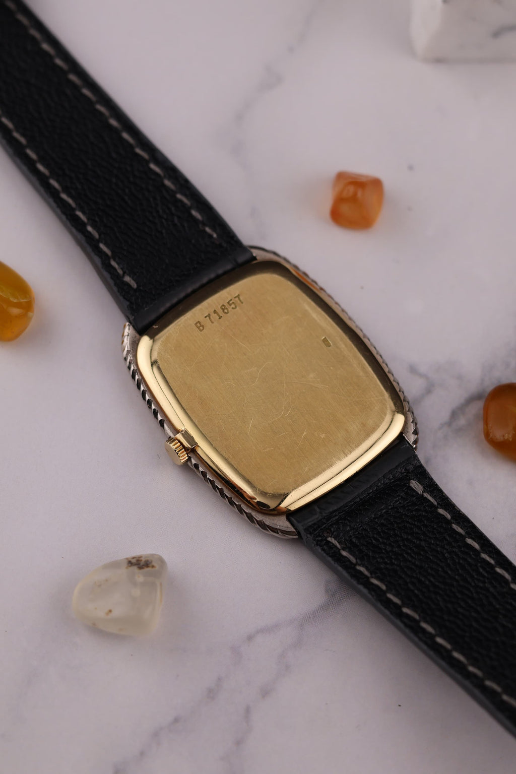 Case back of Audemars Piguet dress watch in white and yellow gold housing Calibre 2003 manual movement