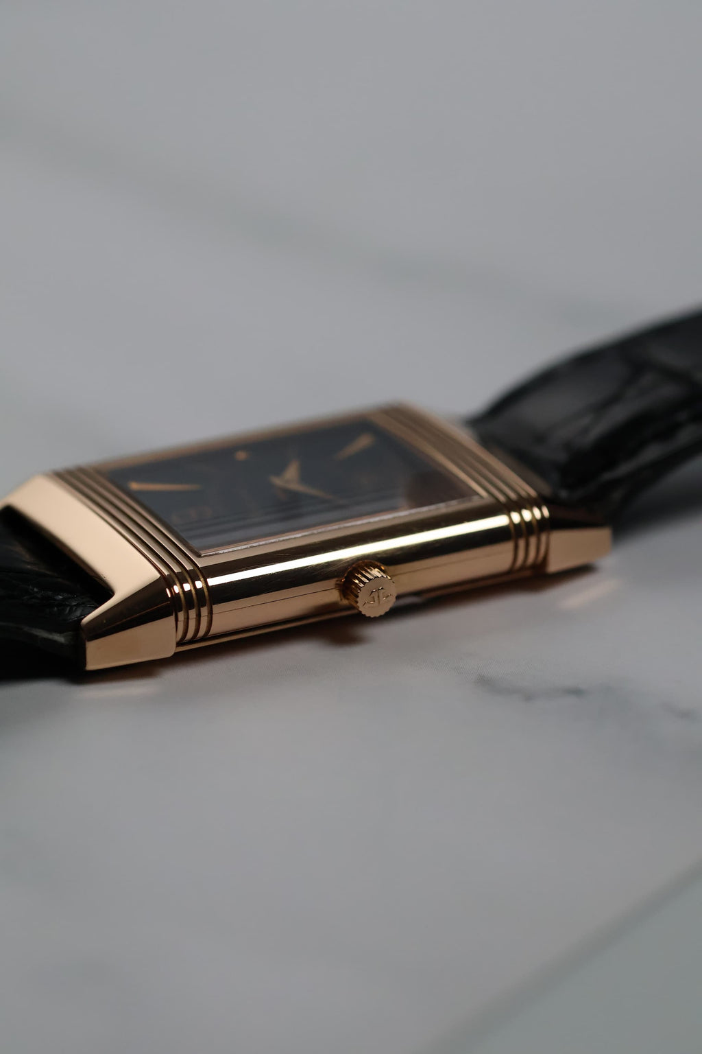 Macro shot of the Reverso 250.2.86 crown and case side, revealing fine finishing and original condition.