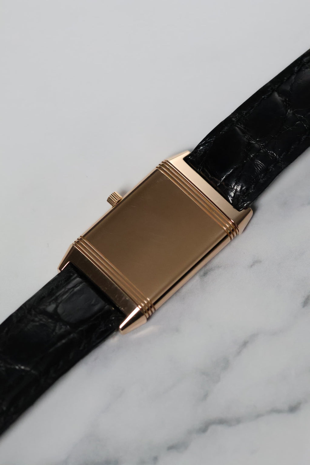 Solid back of Reverso 250.2.86 showcasing the solid 18K rose gold face.