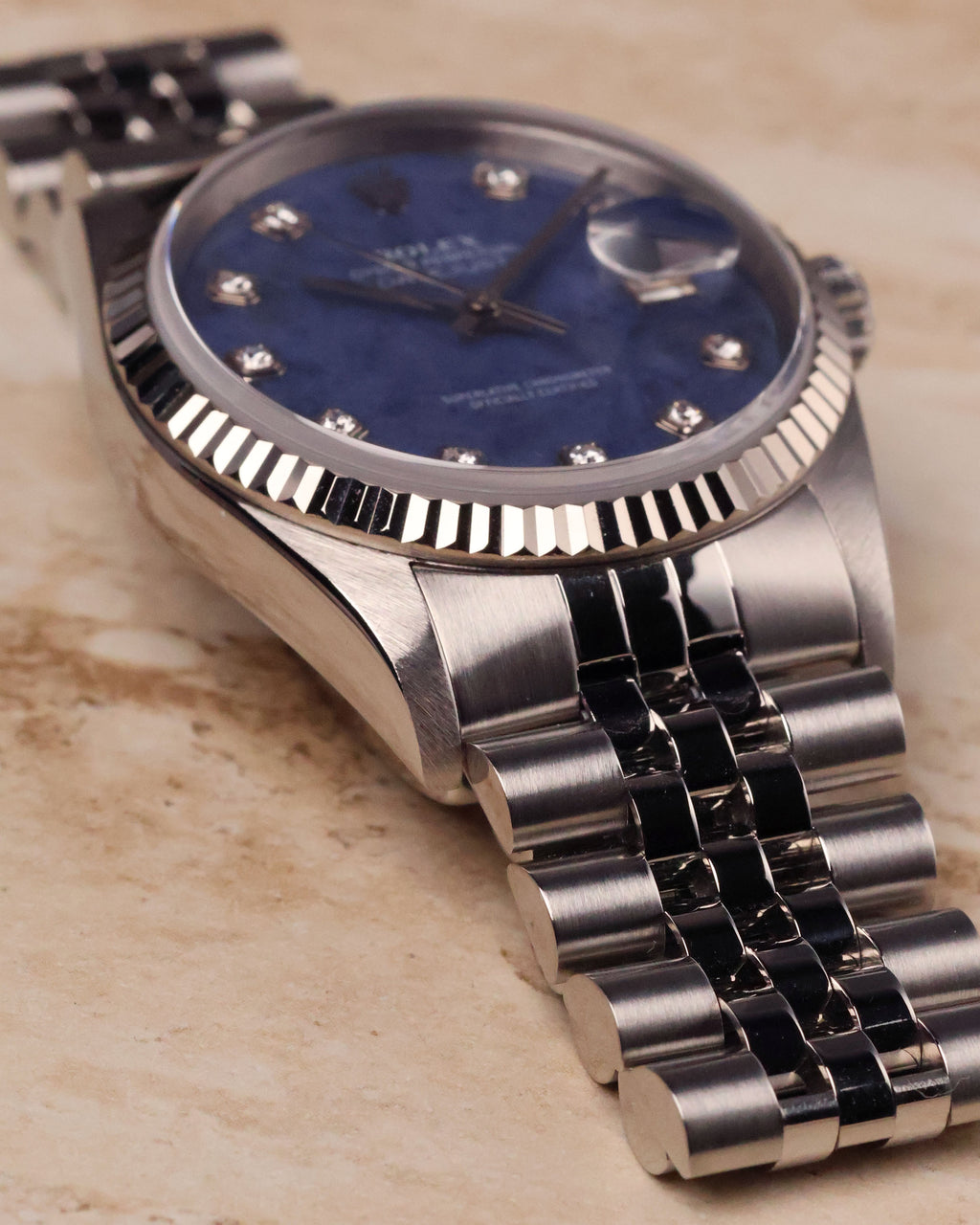 Low angle shot of Rolex Datejust 16234 highlighting case profile and bezel