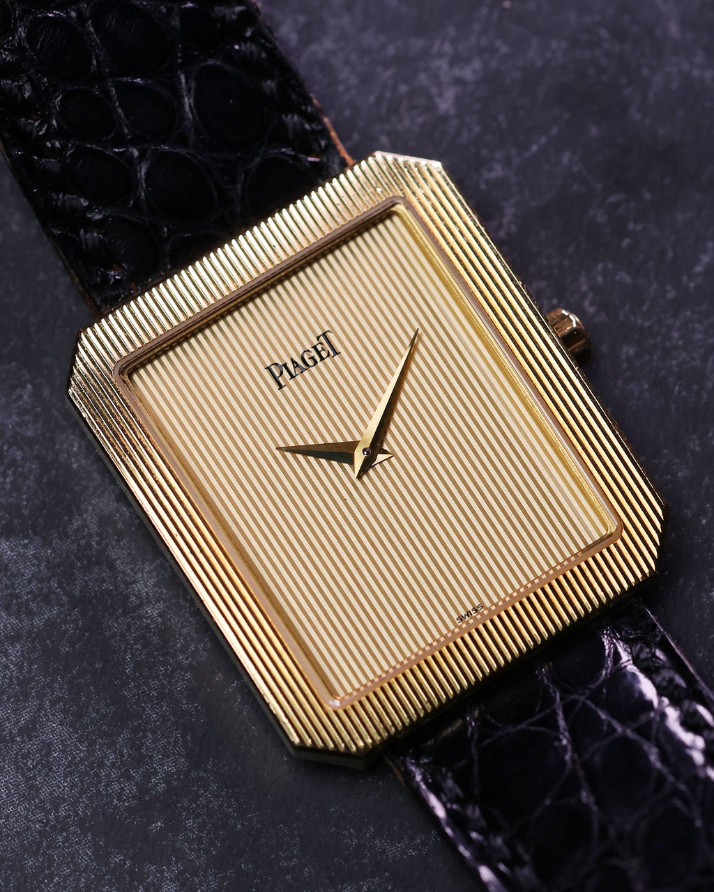 Front view of Piaget Protocole 90154 showcasing rectangular case and minimalist gold dial.