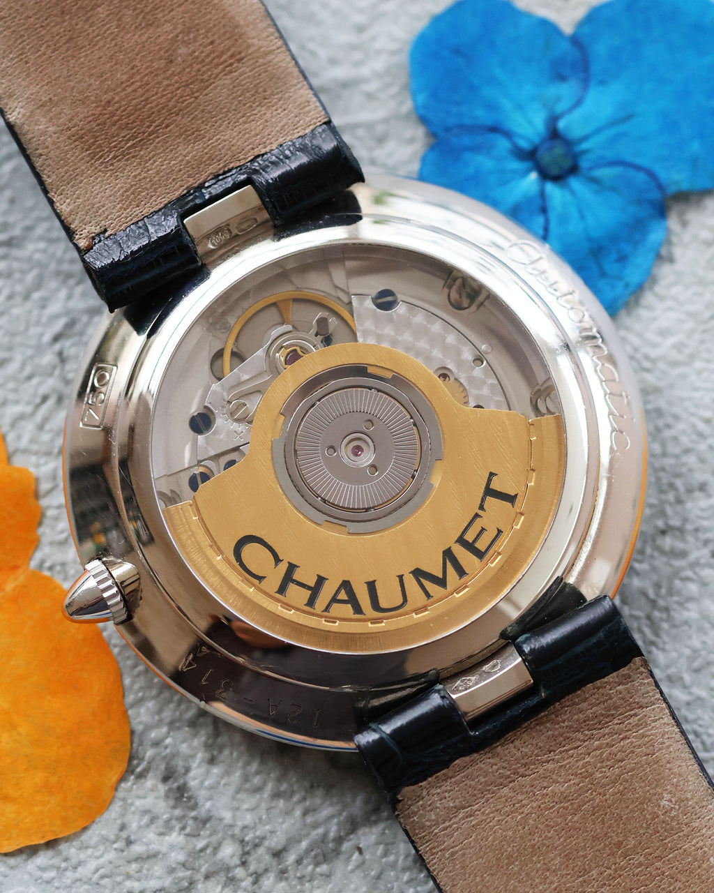 Chaumet Dress Watch Ref. 12A caseback with sapphire display, automatic ETA 2892-2 visible.