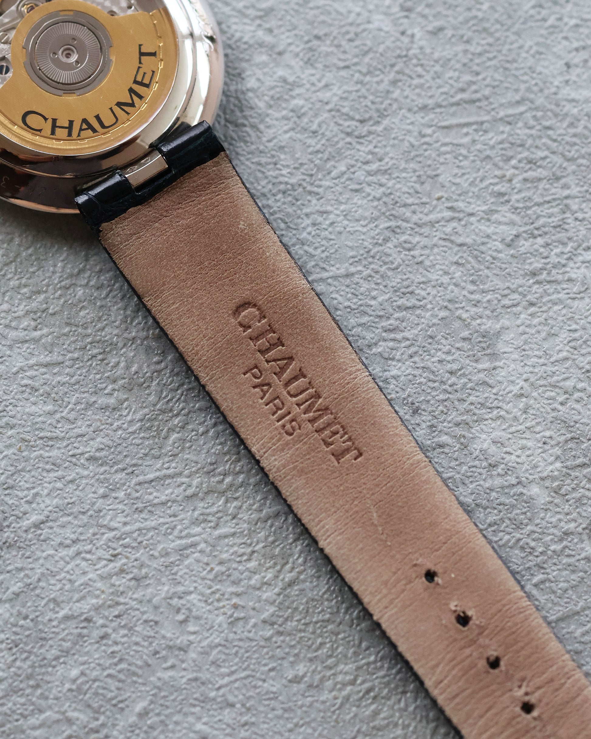 Original Chaumet alligator strap featuring embossed Chaumet logo.