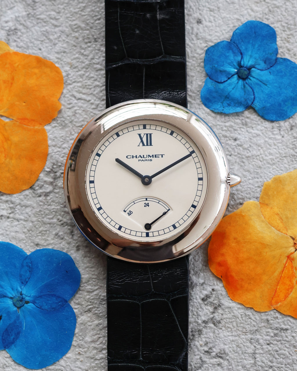 Chaumet Dress Watch 12A, 36mm white gold case, blued hands and silver dial, close-up main shot.