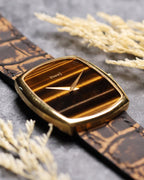 Low-angle view highlighting the slim profile and Tiger’s Eye stone dial of the Piaget Ref. 9741