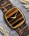 Piaget Ref. 9741 in 18K yellow gold with horizontal Tiger’s Eye dial, full frontal view