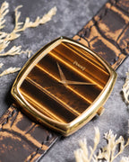 Vintage Piaget 9741 watch in yellow gold with original gold buckle, displayed on strap