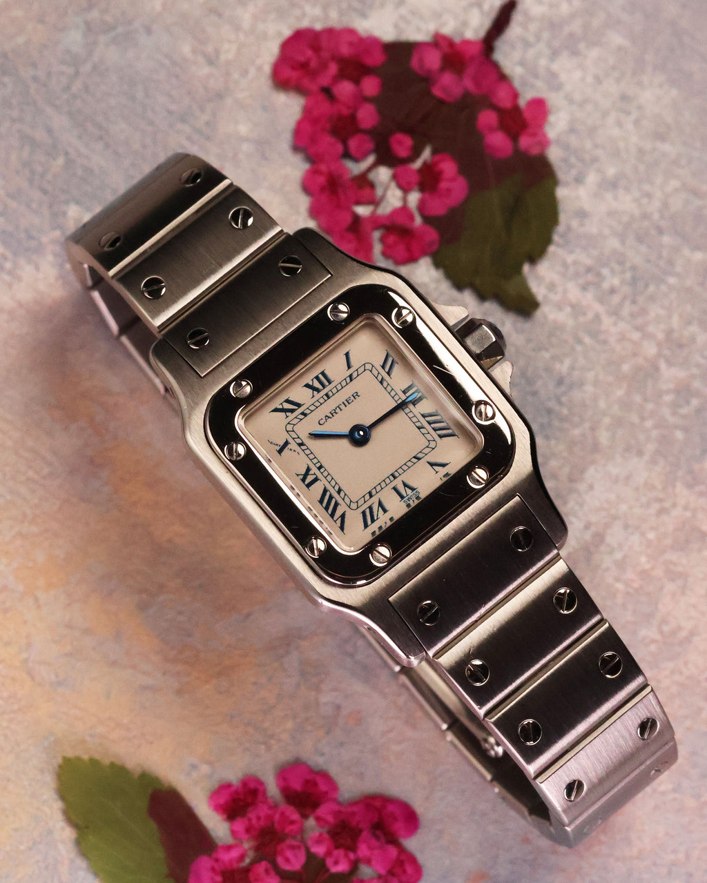 Cartier Santos Galbée Ref. 1565 front view showcasing integrated bracelet and classic dial