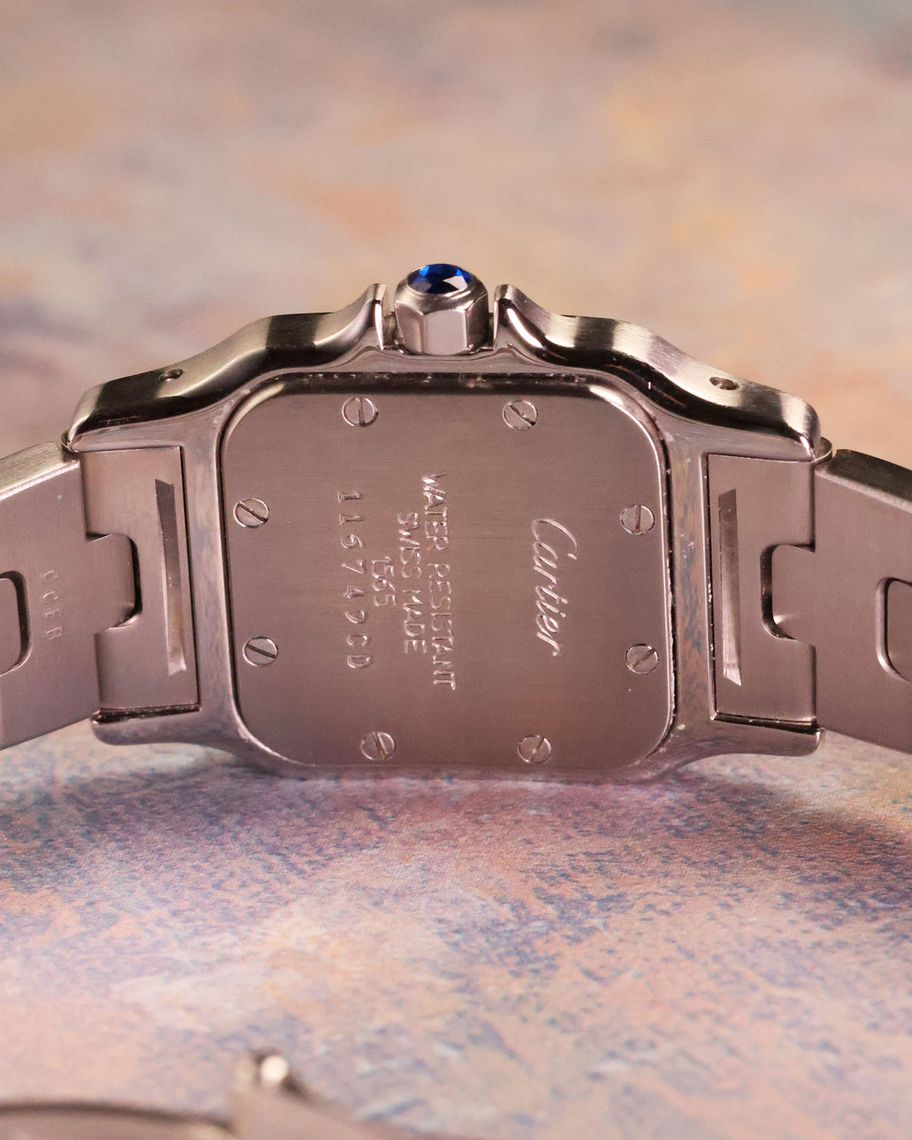 Cartier Santos Galbée Ref. 1565 stainless steel caseback with reference engravings