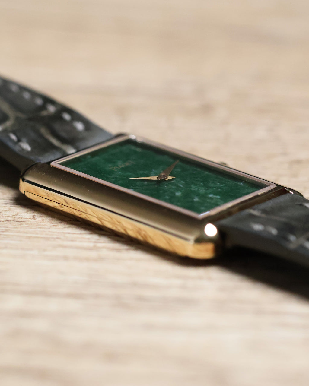 Slim profile of Piaget 9228 in 18k yellow gold case with leather strap