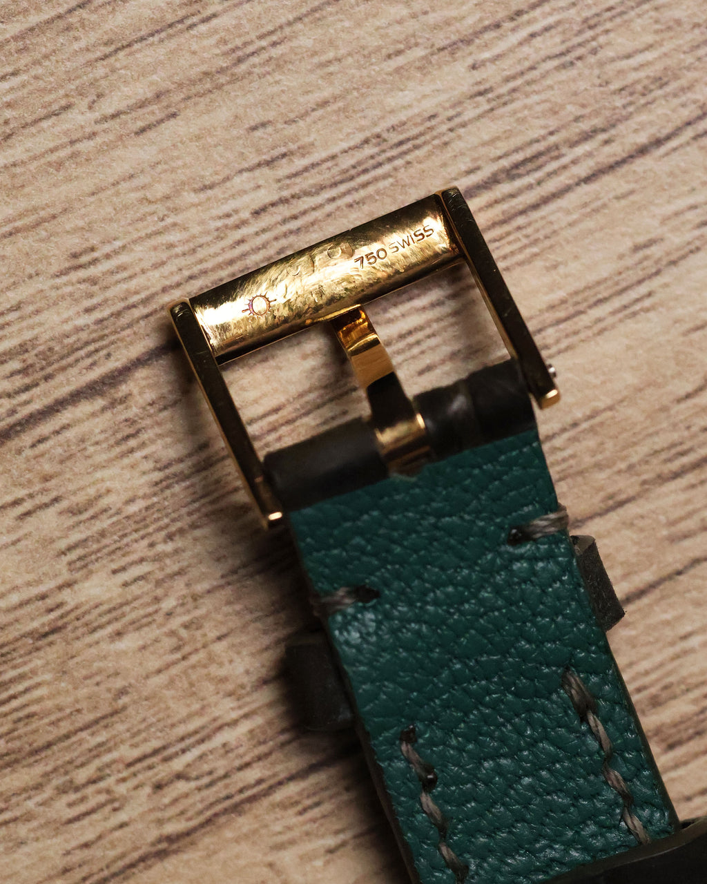 Original 18k yellow gold Piaget buckle, bottom view with hallmark detail