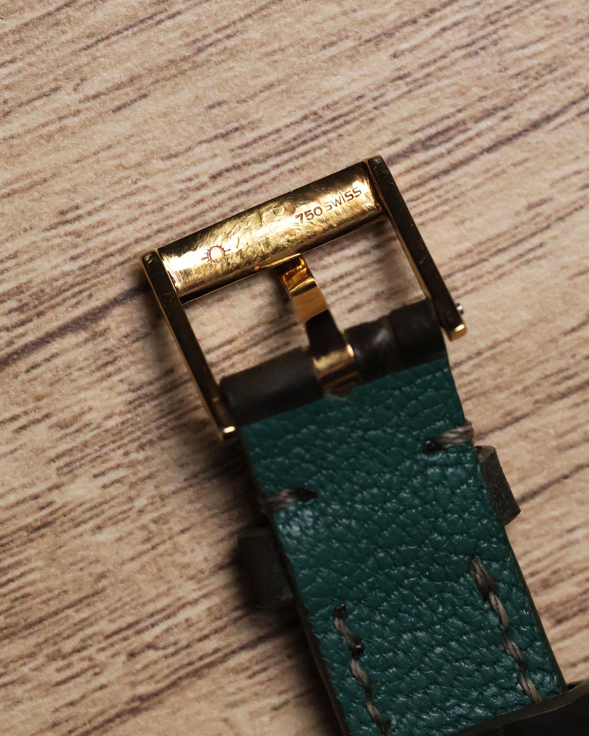 Original 18k yellow gold Piaget buckle, bottom view with hallmark detail