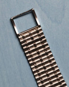 Detailed view of integrated 18k white gold bamboo-style bracelet links of the Audemars Piguet Bamboo 27mm