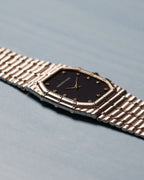 Side profile view of Audemars Piguet Bamboo 27mm white gold watch showing case thickness and bracelet integration