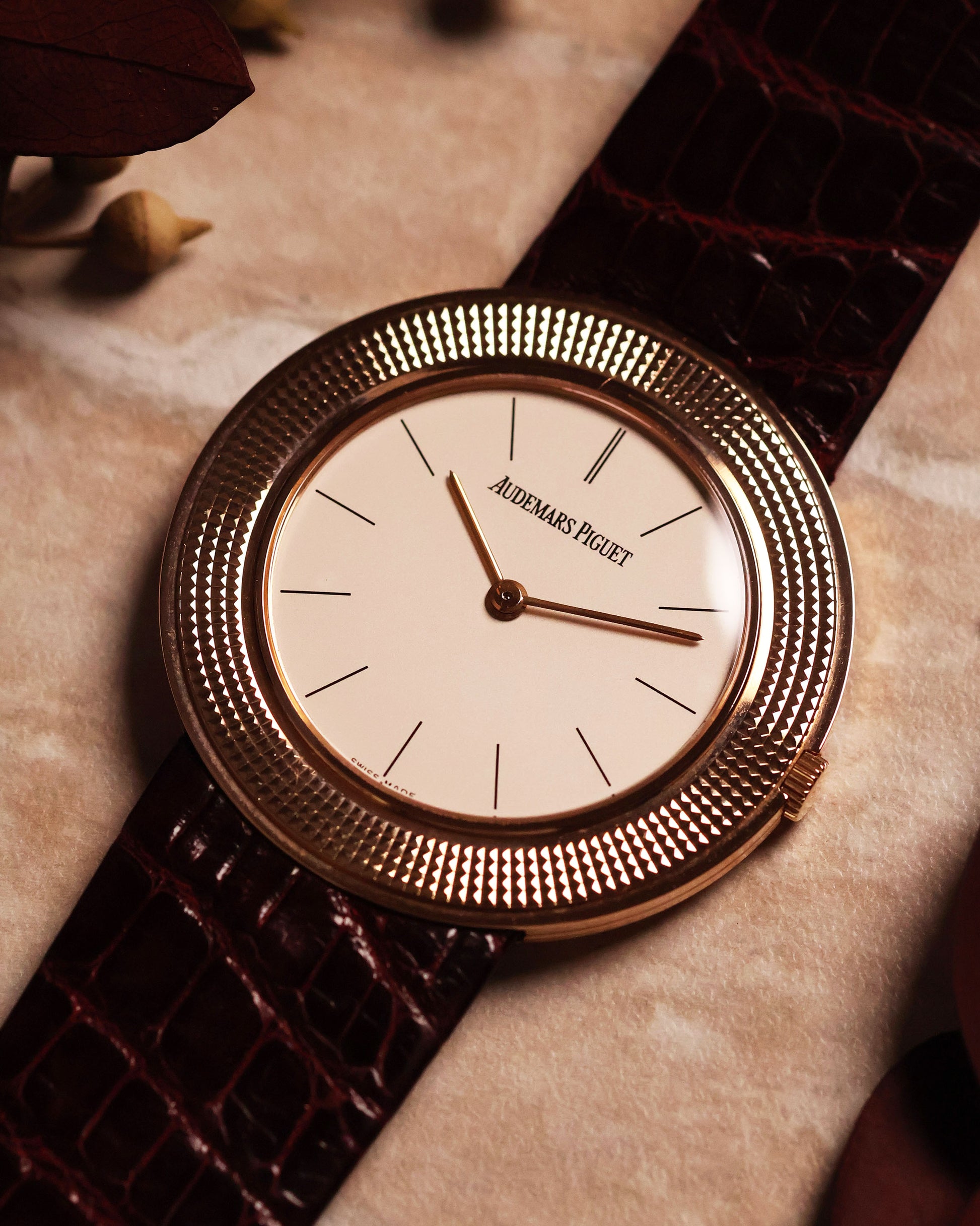 Complete Audemars Piguet Disco Volante in 18k rose gold with leather strap and original buckle, photographed upright