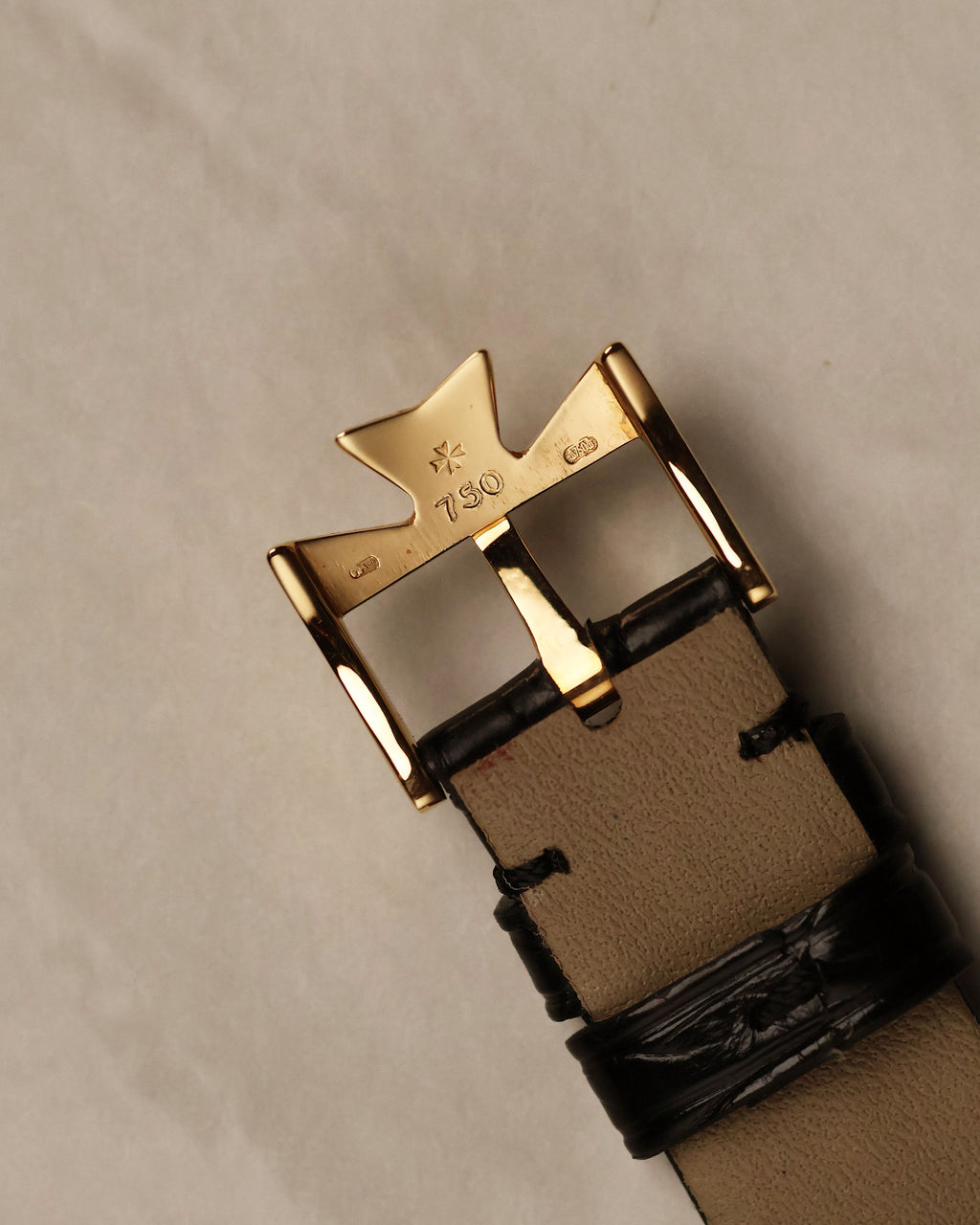 Underside of Vacheron Constantin 18k gold buckle with engraved markings