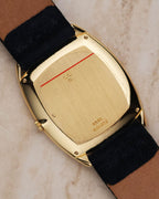 Solid gold caseback engraved with reference and serial numbers, displaying French hallmarks and brushed finishing.