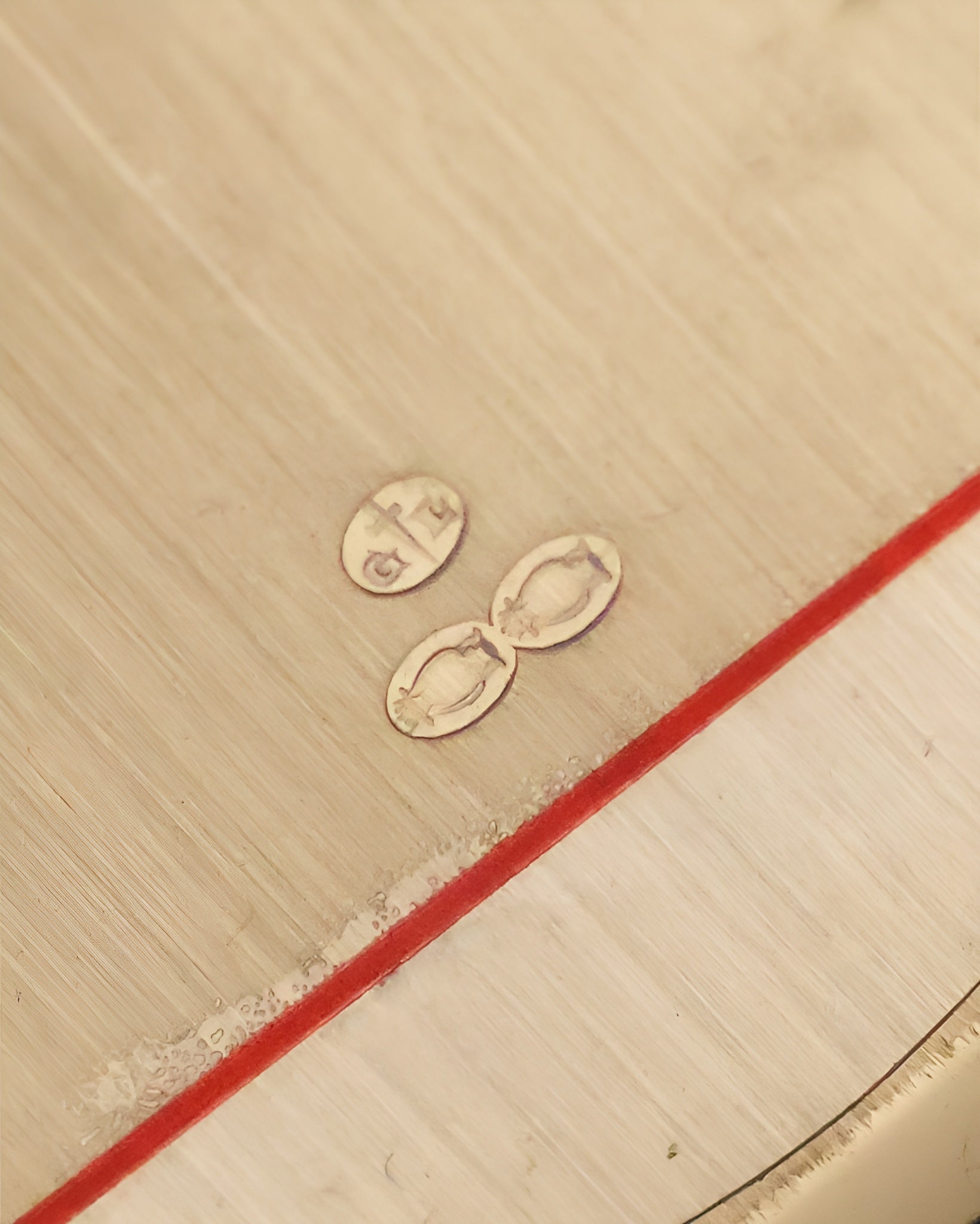 Detailed view of the owl hallmarks and maker’s mark “GL with dagger,” confirming French import and 18k gold purity.