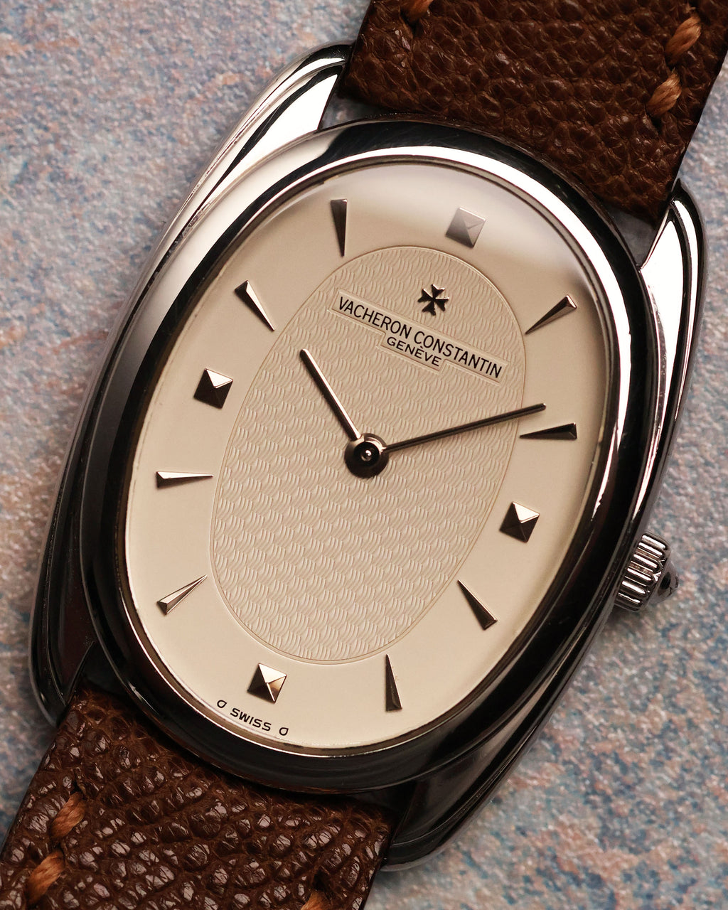 Front view of the Vacheron Constantin Historiques 31110 platinum, showcasing the refined guilloché dial pattern, applied markers, and the brand’s Maltese cross logo.