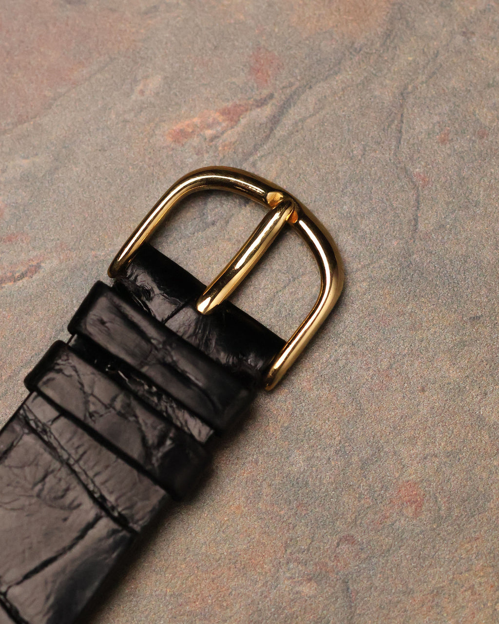 Original gold buckle and black leather strap from Audemars Piguet Skeleton Aperture Tank.