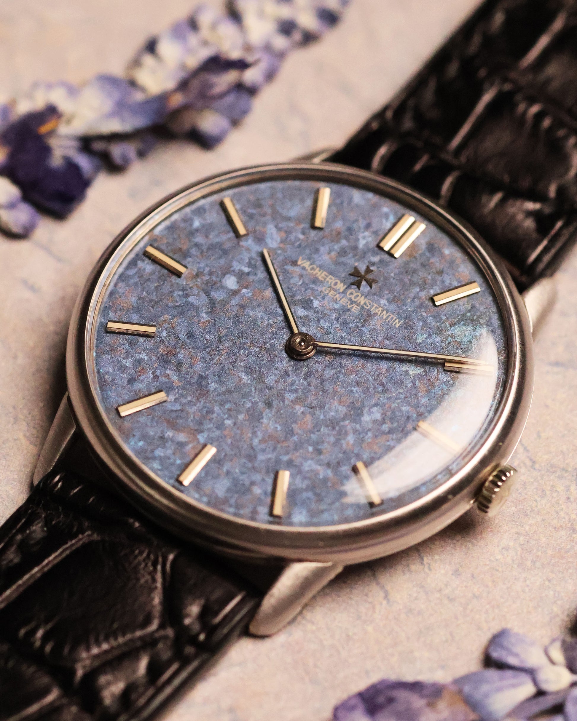 Angled shot of the Vacheron Constantin Ref. 2006 highlighting the mosaic-textured titanium dial with blue tones reminiscent of sodalite stone.