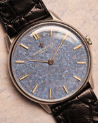 Front view of the Vacheron Constantin Ref. 2006 showcasing the even blue dial texture and minimal gold hour markers in a white-gold case.