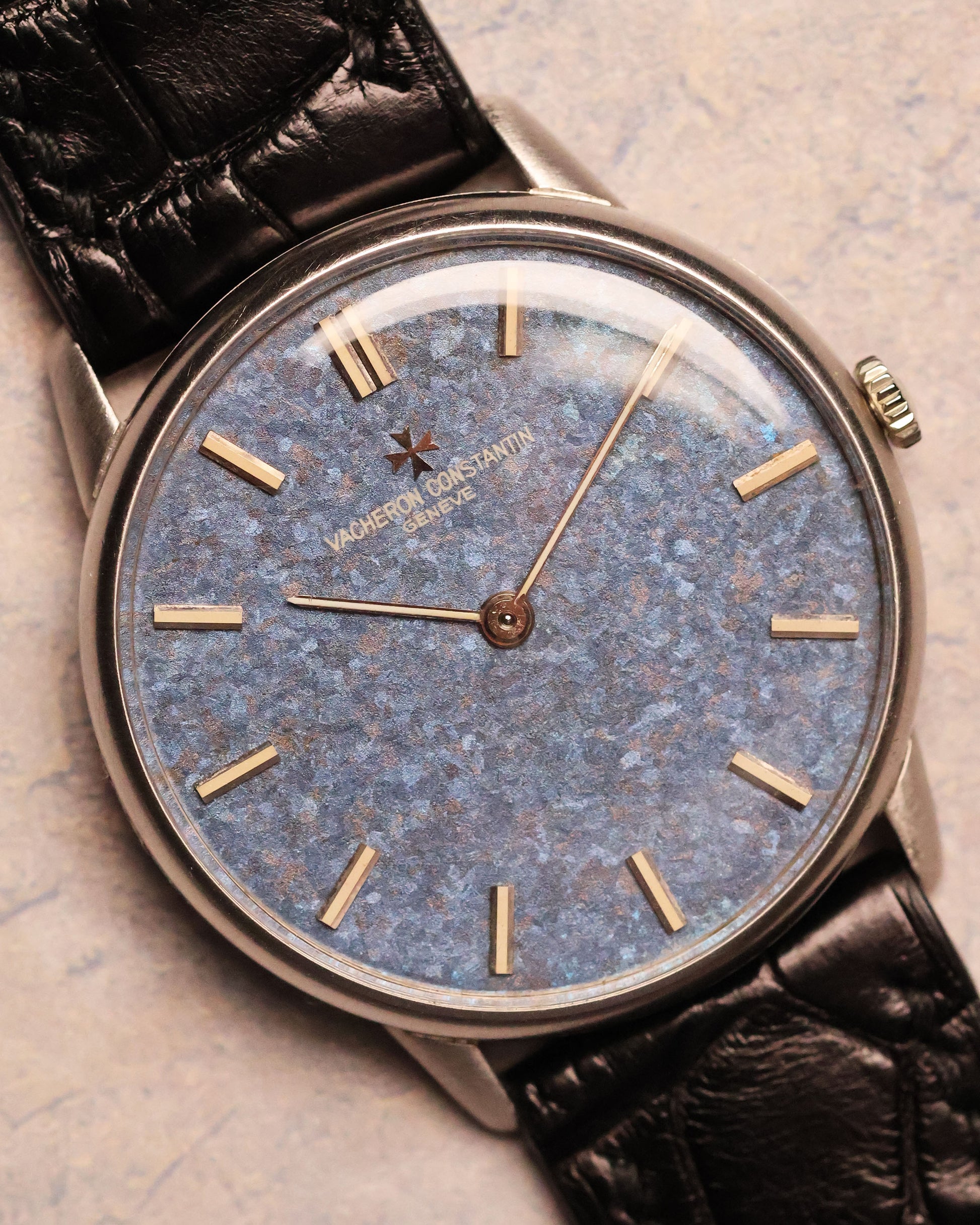 Front view of the Vacheron Constantin Ref. 2006 showcasing the even blue dial texture and minimal gold hour markers in a white-gold case.