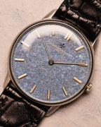Top-down image of the Vacheron Constantin Ref. 2006 emphasizing the subtle dial gradation and delicate light reflections on the titanium surface.