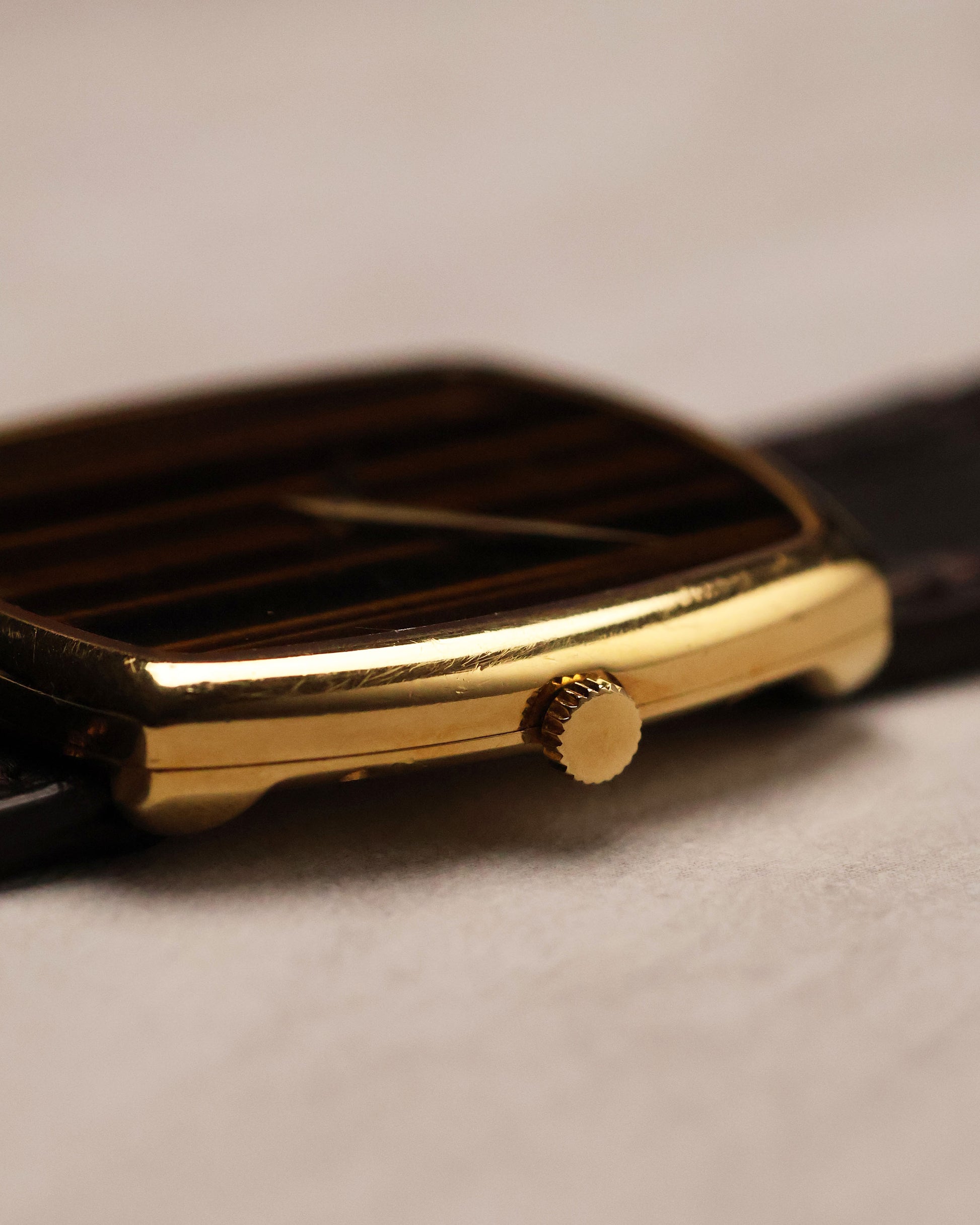 Crown-side view of Piaget Ref. 9741 illustrating the thin gold case and fluted crown design.