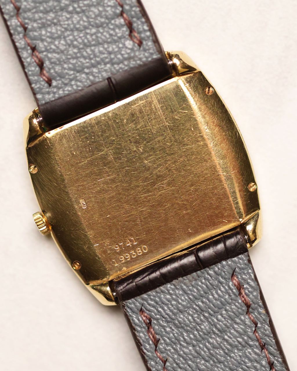 Caseback view of Piaget Ref. 9741 showing 18K gold hallmark, model number 9741, and serial engraving 199380.