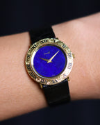 Close-up of a Piaget Ref. 9118 watch with a deep blue lapis lazuli dial on wrist