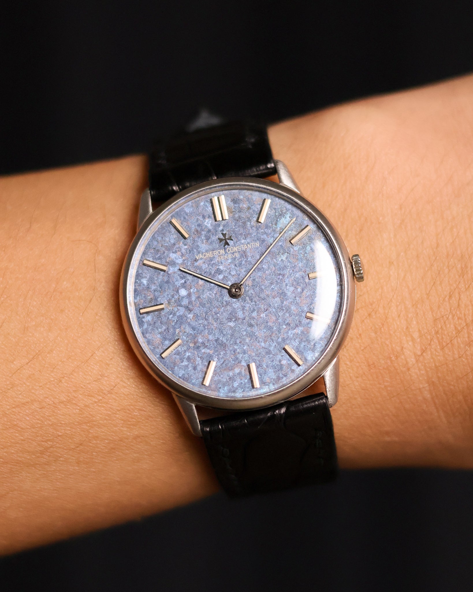 Close-up wrist shot of of the Vacheron Constantin Ref. 2006 showing the titanium blue mosaic dial.