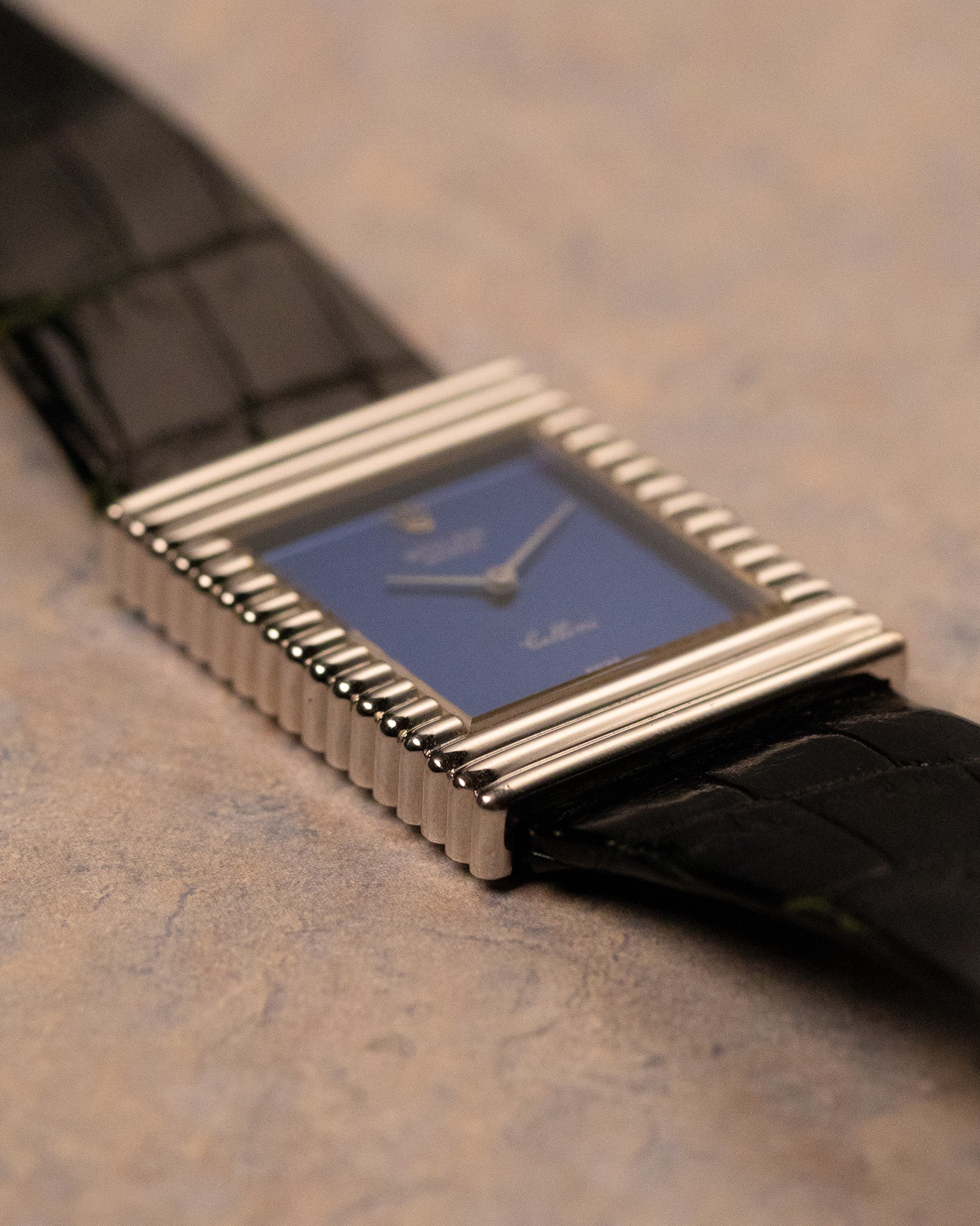 Side profile of Rolex Cellini 4012 showing ribbed white gold case architecture