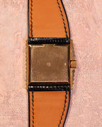 Rear view of the Rolex Cellini Ref. 4015 showing the gold caseback, signed crown, asymmetric case construction, and leather strap.