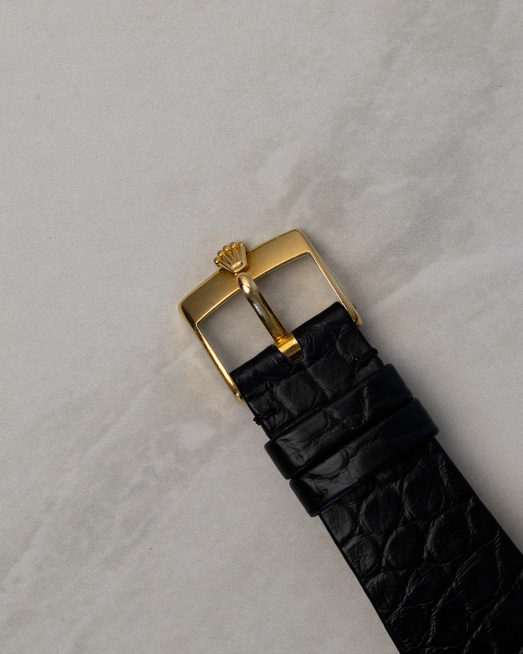 18K yellow gold Rolex buckle fitted to black leather strap on Rolex Cellini 4016