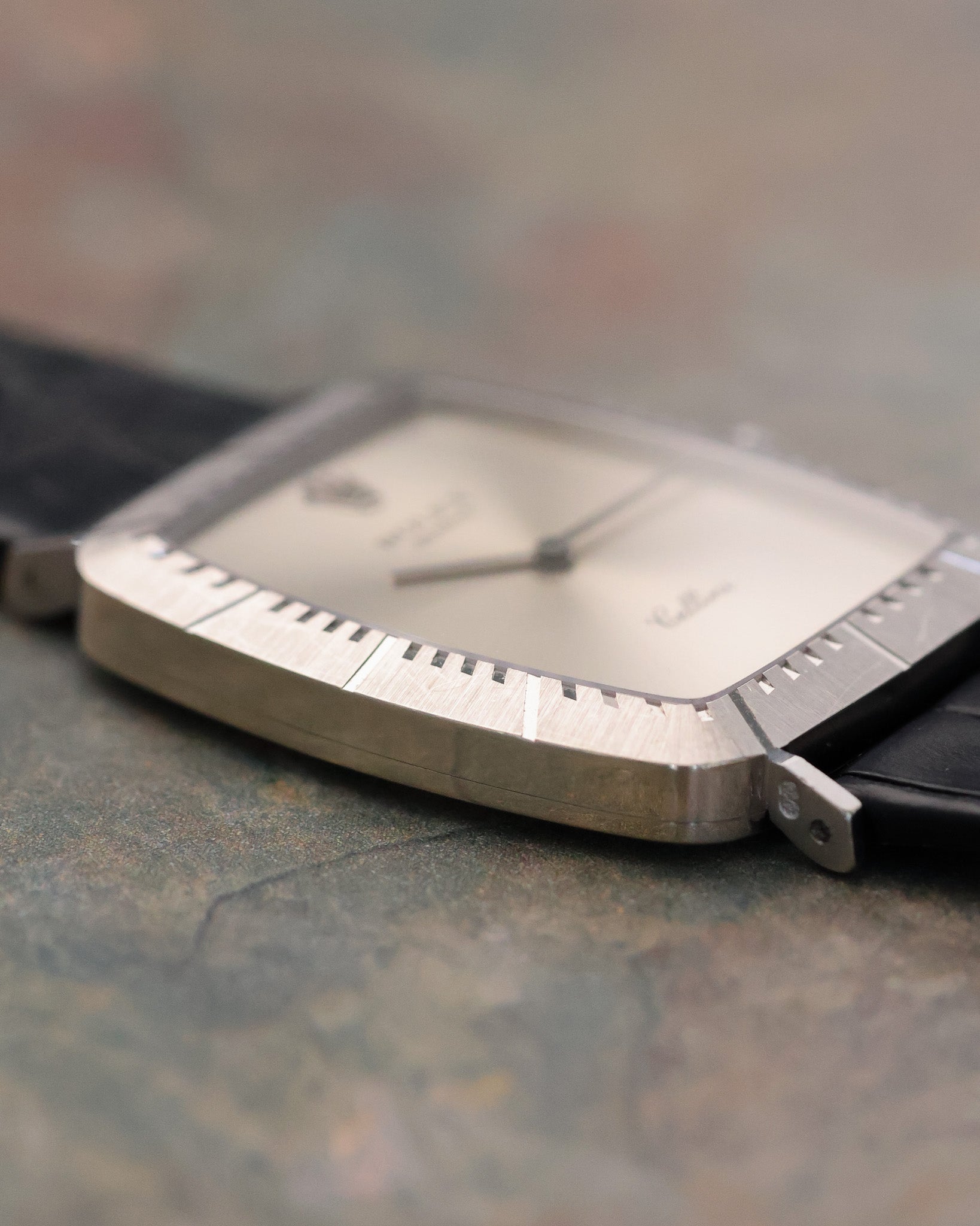 Angled side perspective of Rolex Cellini 4087 emphasizing cushion case contours, radial bezel accents, and elegant dial proportions.