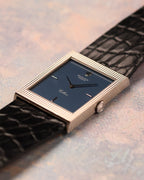 Three-quarter view showcasing the rectangular proportions, matte blue dial, and crisp Clous de Paris engraving on the Rolex Cellini Ref. 4127.