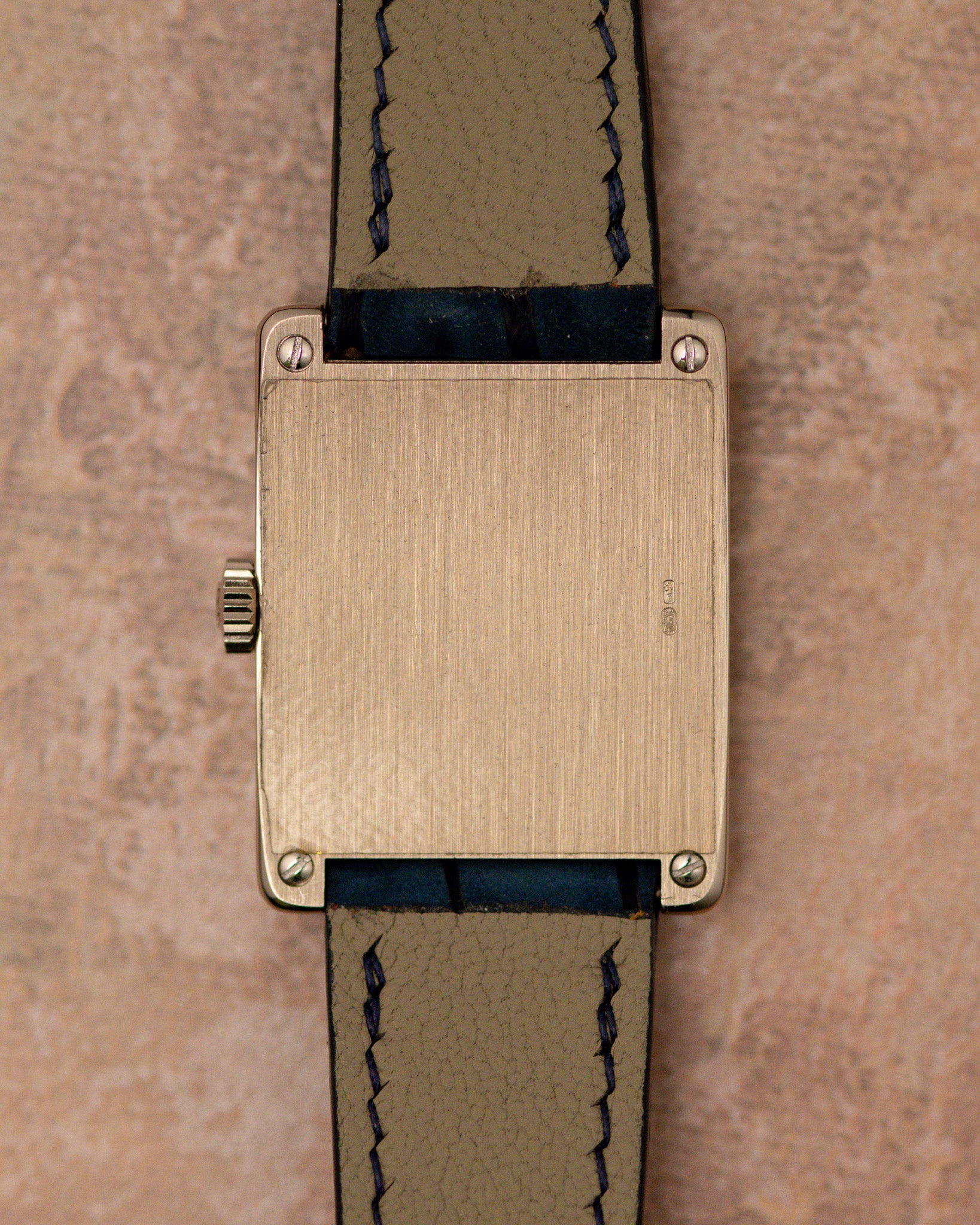 Caseback view of Patek Philippe Gondolo 5010 in 18k white gold showing brushed rectangular back