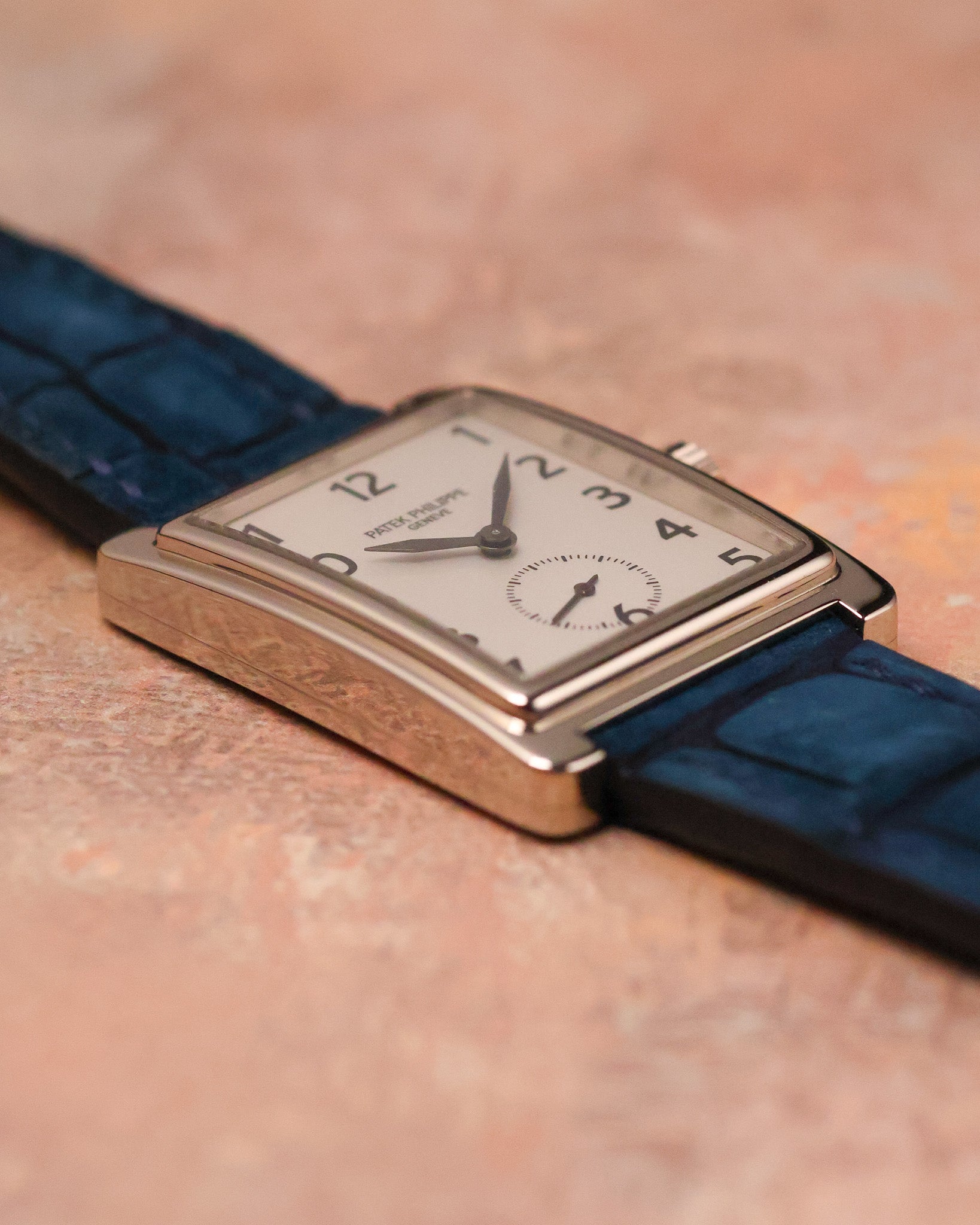 Side profile of Patek Philippe Gondolo 5010 showing curved white gold rectangular case