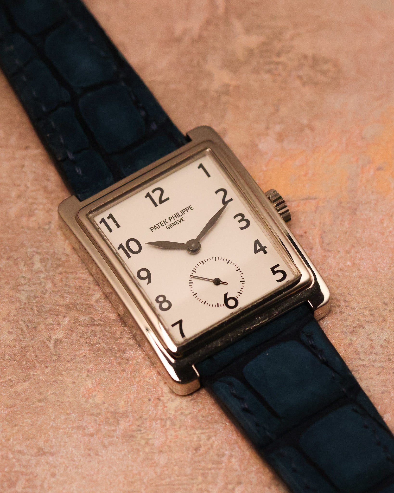 Three-quarter view of Patek Philippe Gondolo 5010 emphasizing Art Deco rectangular case design