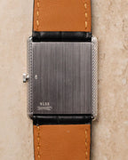 Caseback of Piaget Ref. 9152 displaying brushed 18K white gold surface with engraved reference number and crown positioned at left.