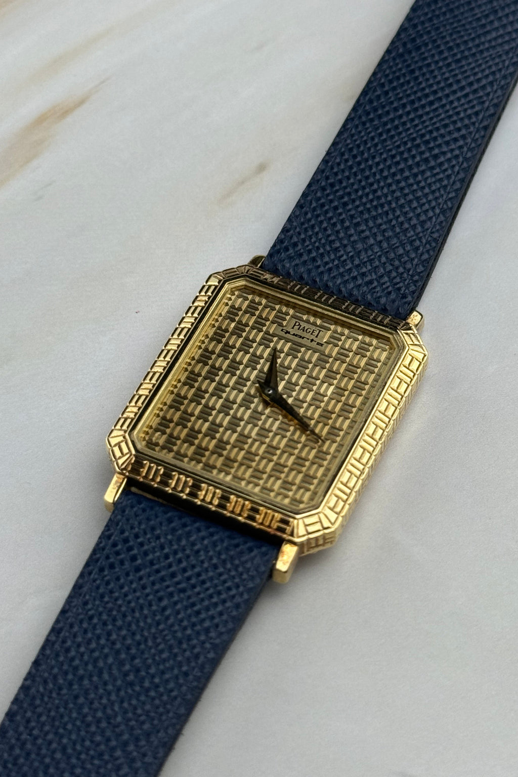 Piaget Ref. 7143 vintage dress watch in solid 18K yellow gold with Art Deco grid case and dia