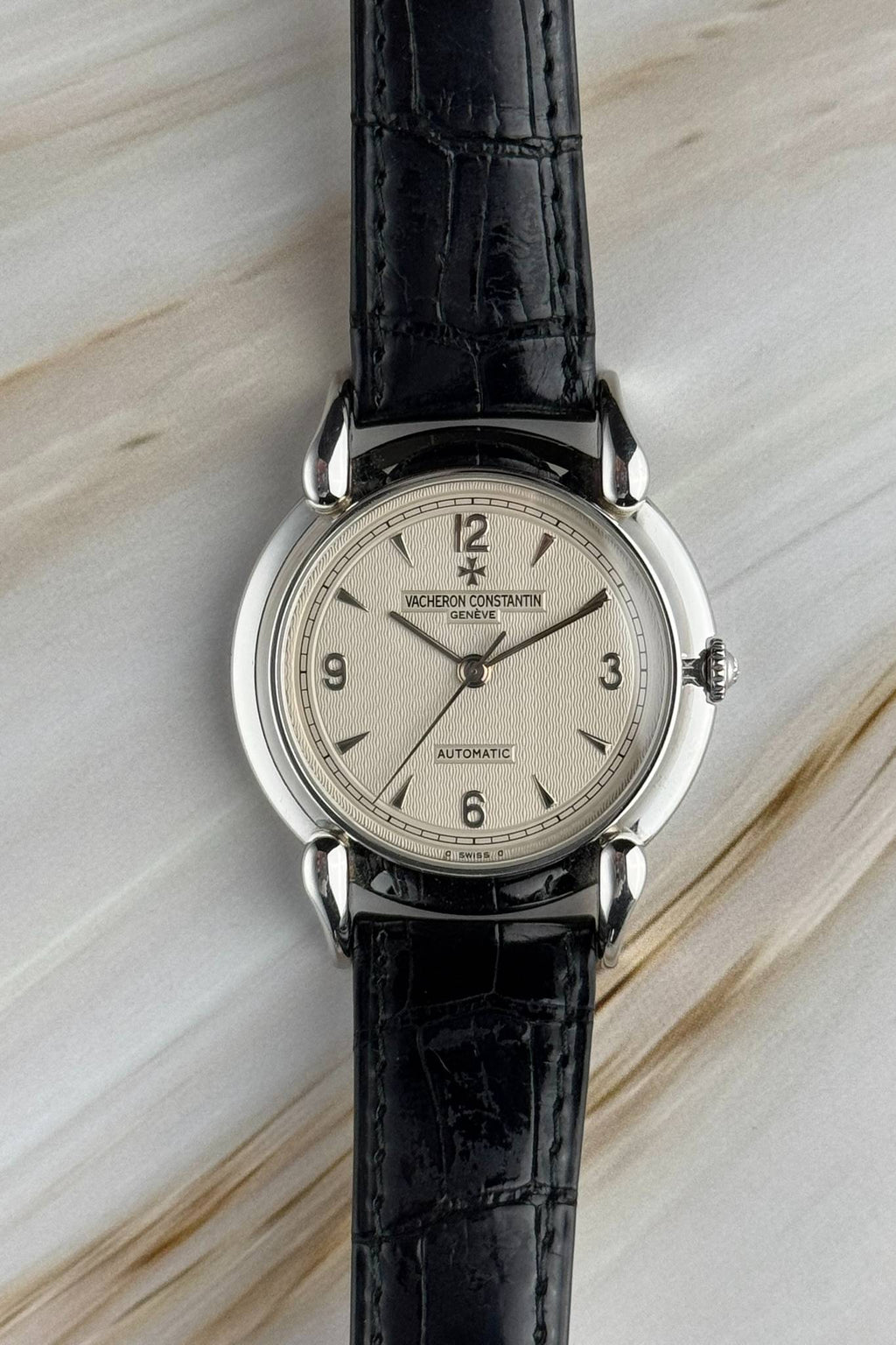Vacheron Constantin Ref. 48003 vintage watch featuring sculptural Cornes de Vache lugs and textured dial