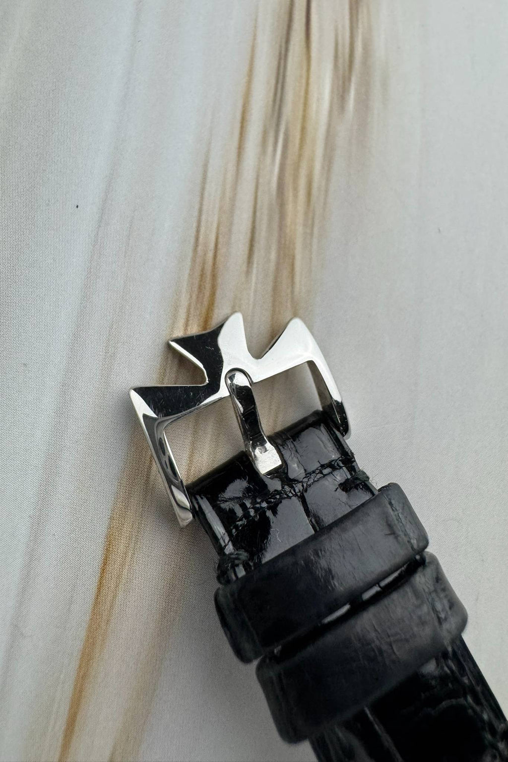 Close-up of signed Vacheron Constantin buckle in platinum, fitted on factory strap
